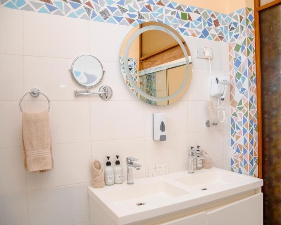 Фотографія Double A Nungwi Beach Hotel 4*