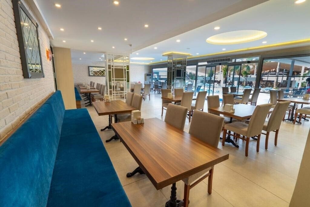 Фотография Azak Beach Otel (ex. Kleopatra Azak Beach Hotel, Azak Beach Hotel) 4*