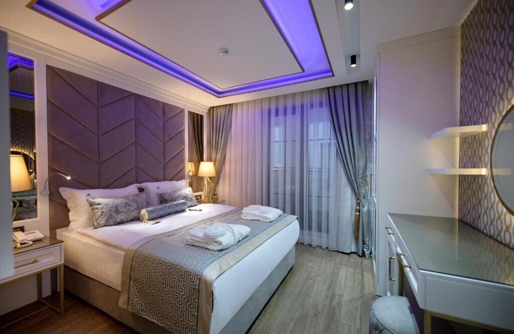 Фотографія Elysium Green Suits Boutique 3*