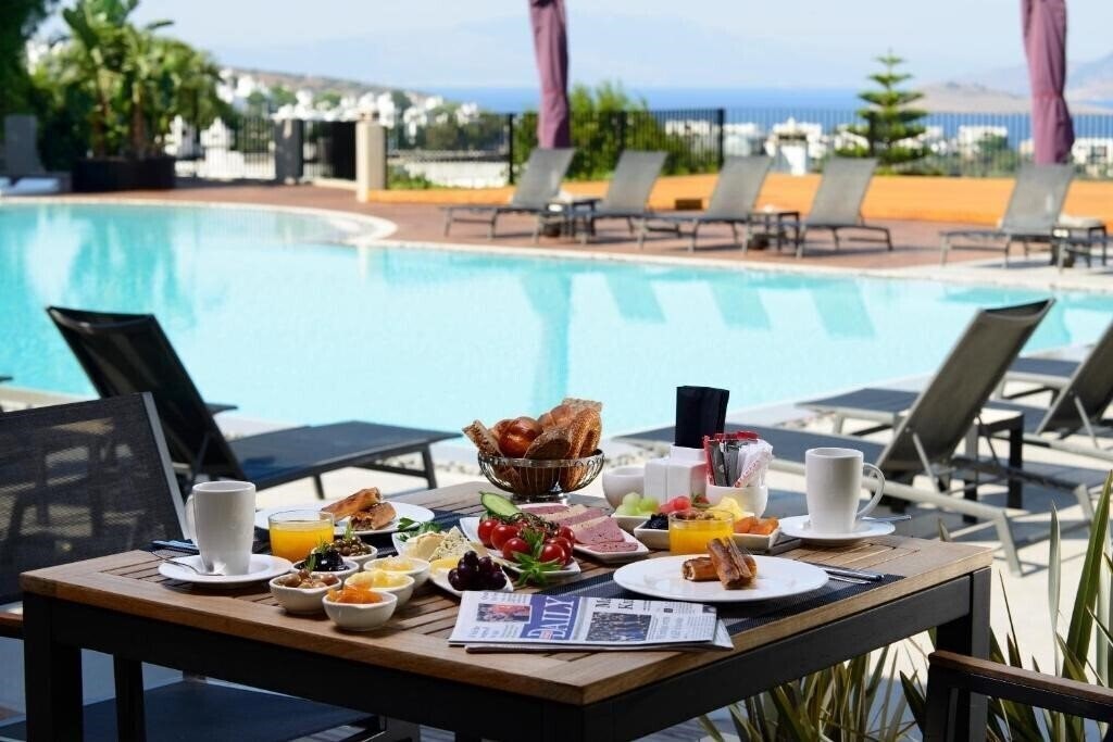 Zdjęcie Ramada Resort Bodrum 4*