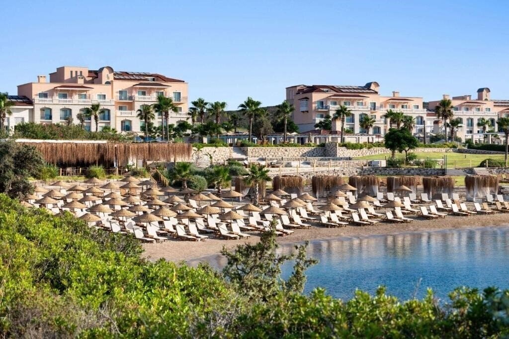 Фото Dolce by Wyndham Cesme Alacati (ex. Double Tree by Hilton Cesme Alacati Beach Resort, Porto Beach Resort Exclusive Alacati Boutique) 4*