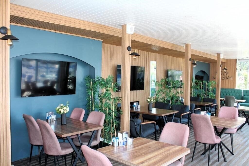 Фотография Mavi Pansiyon & Restaurant (ex. Mavi Kitchen & Bar) 4*