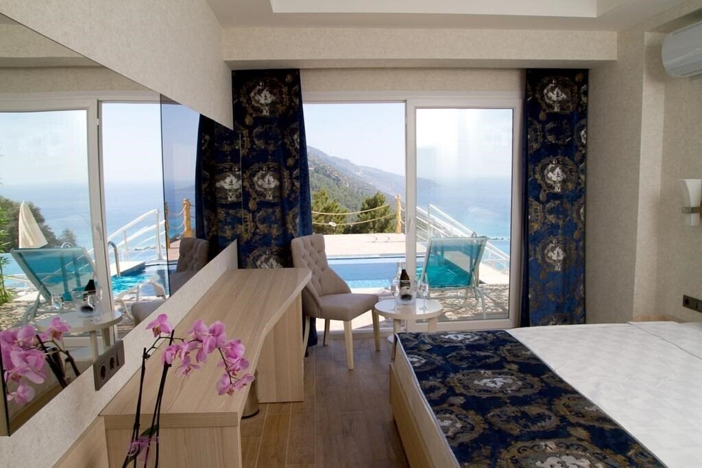 Obraz Sertil Deluxe Hotel & SPA (ex. Tropical Suites by Sertil, Ramada by Wyndham Fethiye Oludeniz) 4*