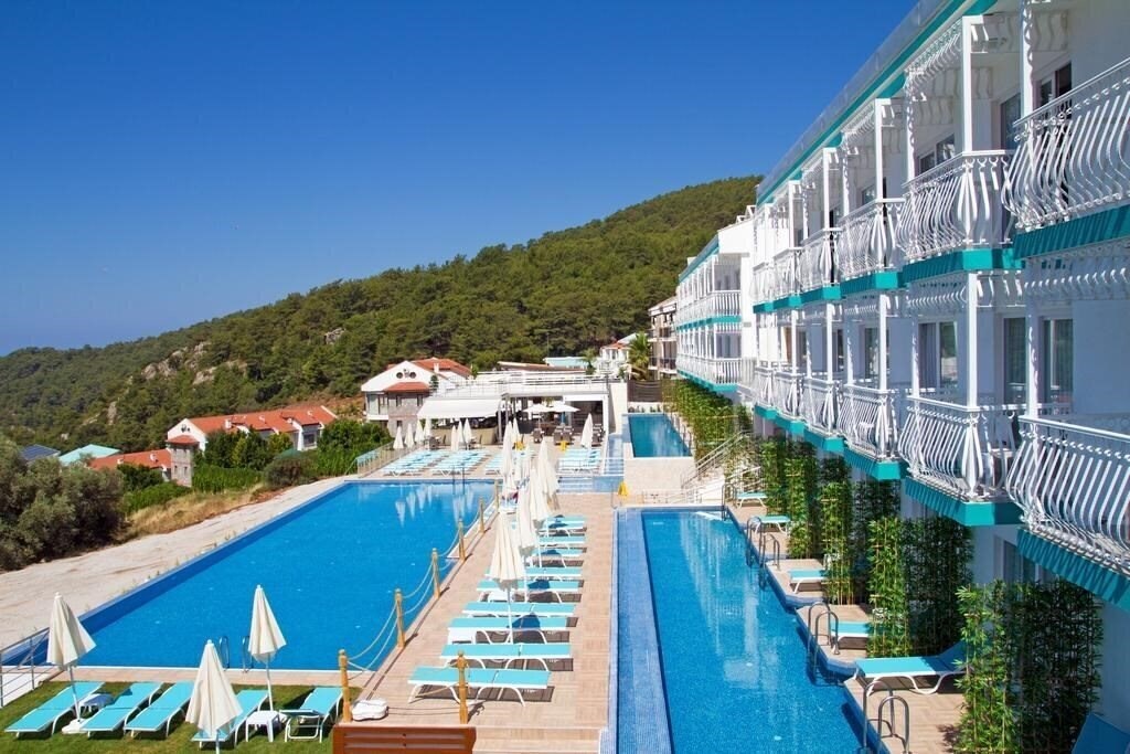 Zdjęcie Sertil Deluxe Hotel & SPA (ex. Tropical Suites by Sertil, Ramada by Wyndham Fethiye Oludeniz) 4*