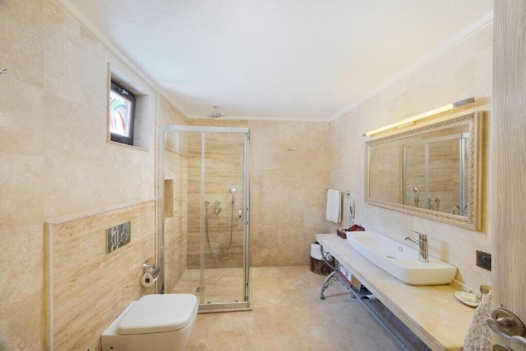 Фотографія Tafoni Houses Cave Hotel (ex. Tafoni Evleri) 5*