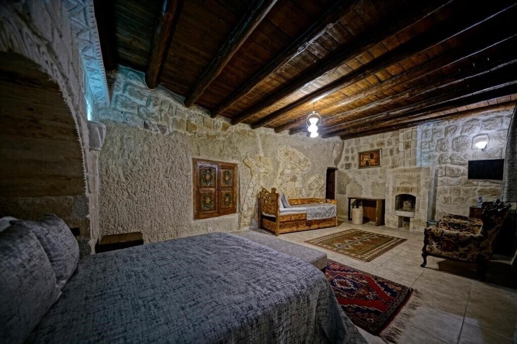 Zdjęcie Holiday Cave Hotel (ex. Flintstones Cave) 3*
