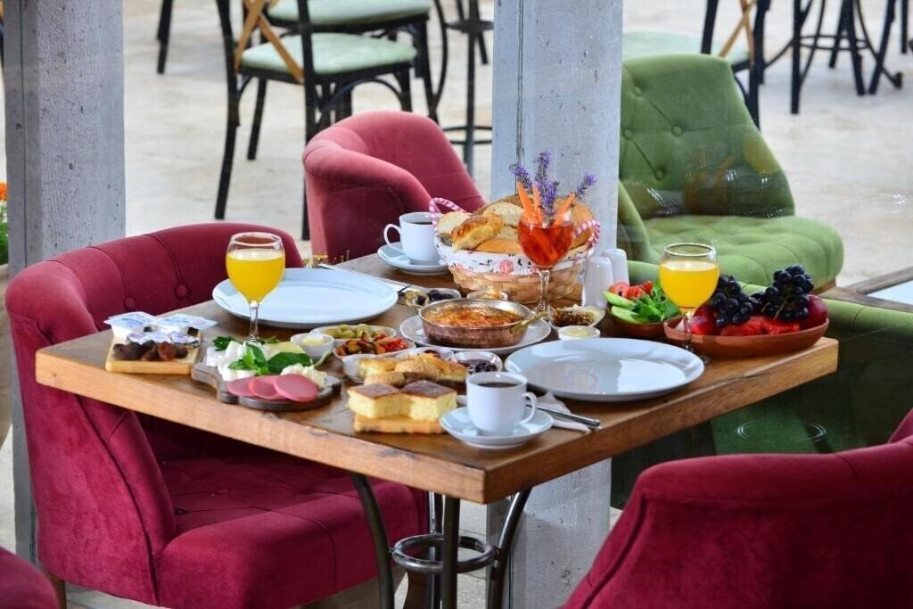 Zdjęcie Caftan Cave Suites 4*