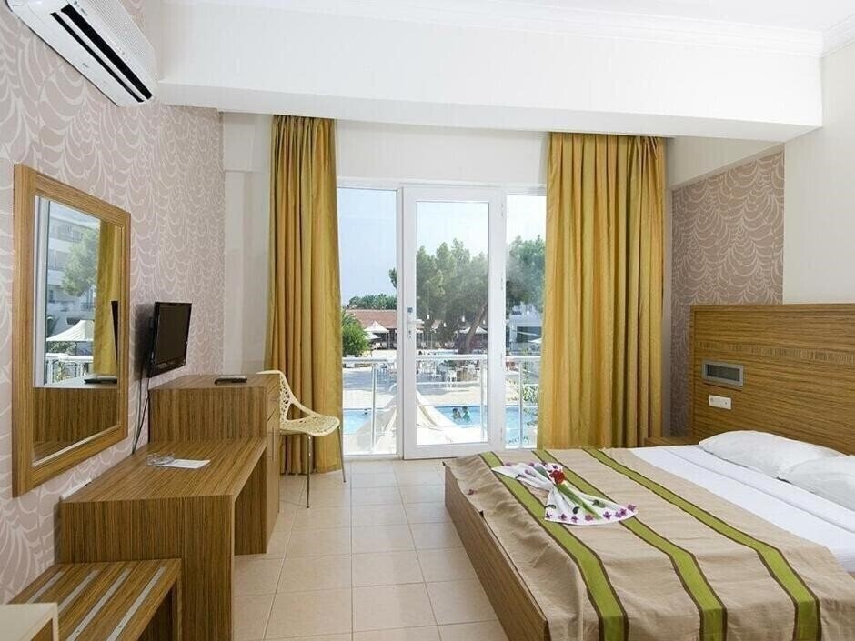 Фотографія Aquabella Beach Hotel 3*