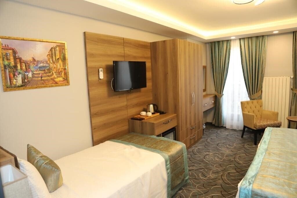 Zdjęcie Grand Kavi Hotel 3*