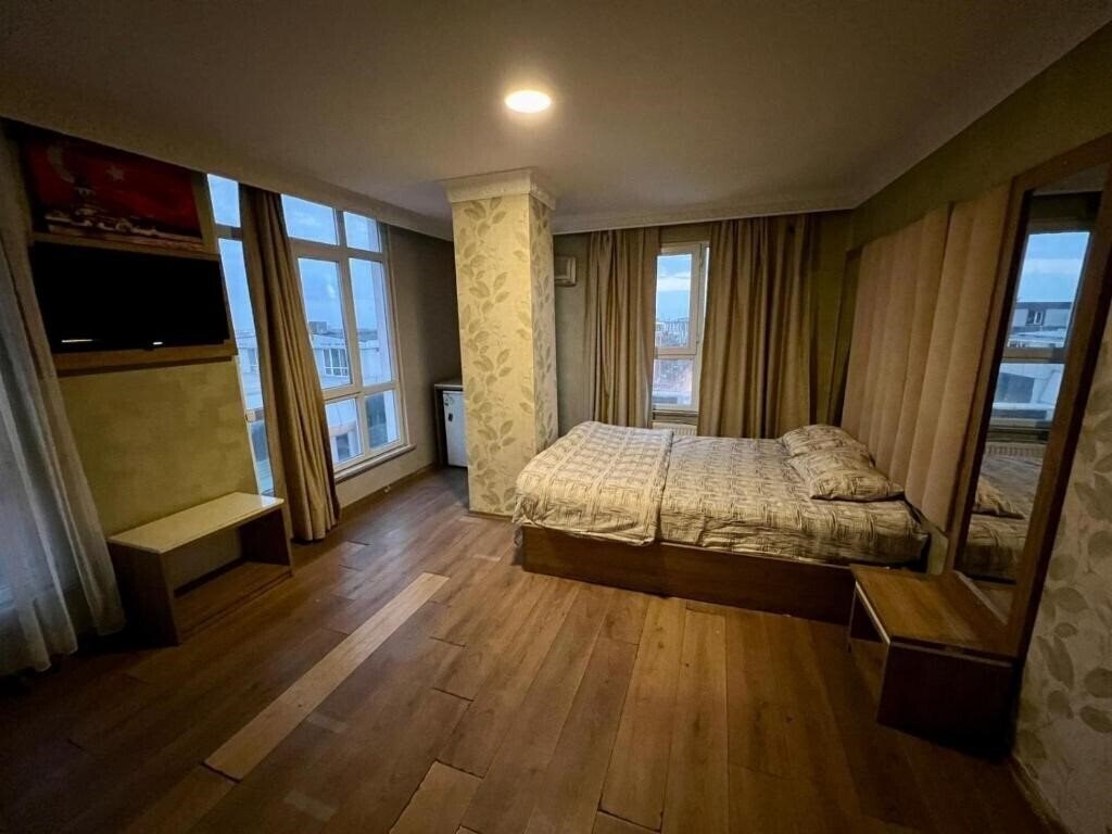 Zdjęcie Camellia Suit Hotel 3*