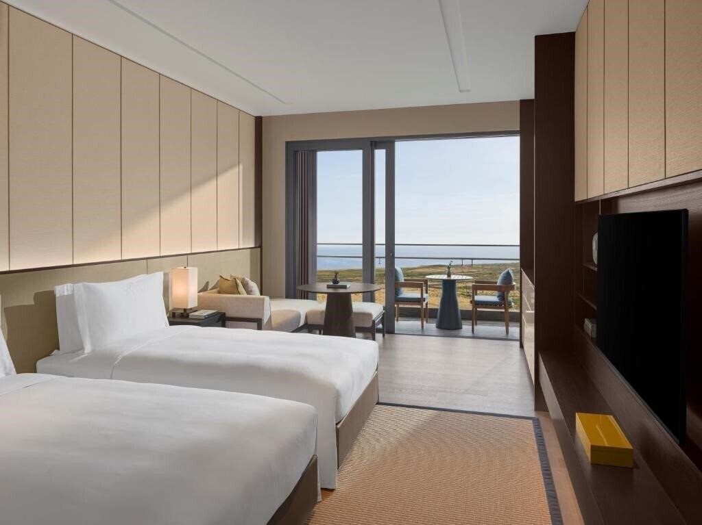 Фотографія New World Hoiana Hotel 5*