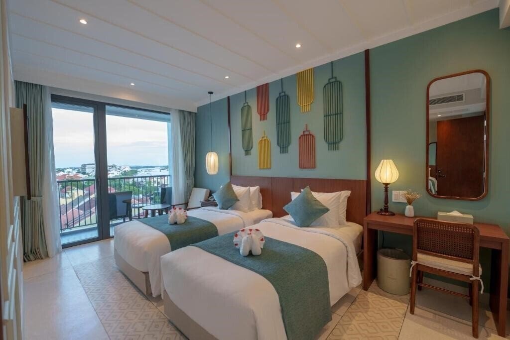 Отель Cozy An Boutique Hotel Hoian 4*